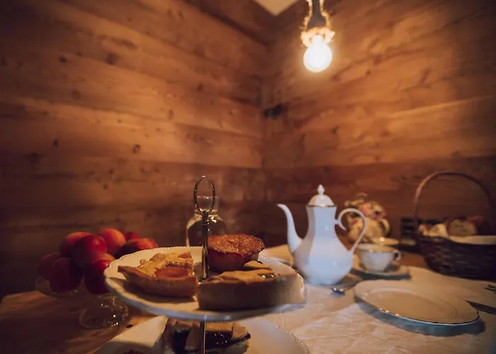 Alojamento de Acomodação e Pequeno-almoço Ca' Mea Room, Wellness & Food 4*